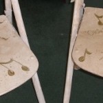 Old folding chairs updated with broadway musical titles- Musical Chairs by Ellen Leigh