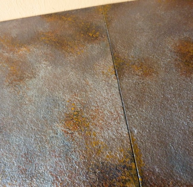 detail of the 'rusted' countertop in the hunters man cave by Ellen Leigh