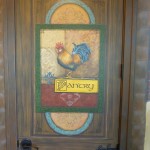 Completed panel with rooster art on door mural by Ellen Leigh