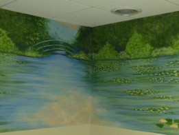 Waterlilies art and a bridge, a soothing mural in a memory care home bathing room. Mural by Ellen Leigh