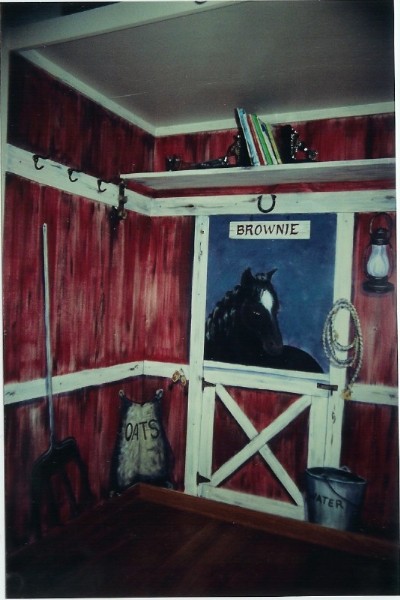 Barn playroom. large closet painted to look like the inside of an old barn with plenty of details and a horse looking in the window. Mural by Ellen Leigh