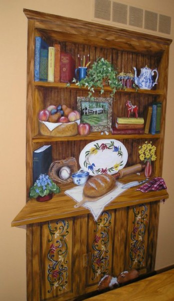 China Cabinet filled with family favorite items. Mural by Ellen Leigh