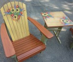 Cottage style deck furniture, stained, distressed and glazed, hand painted details by Ellen Leigh