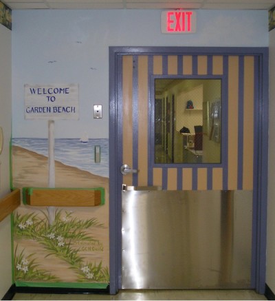 Entry door and mural to the pediatric wing. Mural by Ellen Leigh