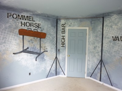 Gymnastics equipment and an artistic background to give it personality and motion. Mural by Ellen Leigh
