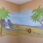 Savannah nursery mural with lion, monkey giraffe and elephant, waterfall in the back ground. Mural by Ellen Leigh