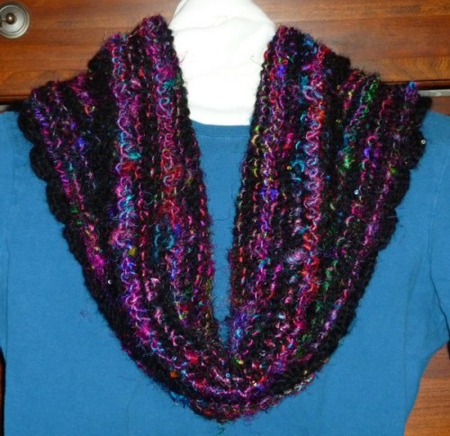Black multicolor scarf  $63.00 on sale at 50% off. Hand knit infnity cowl